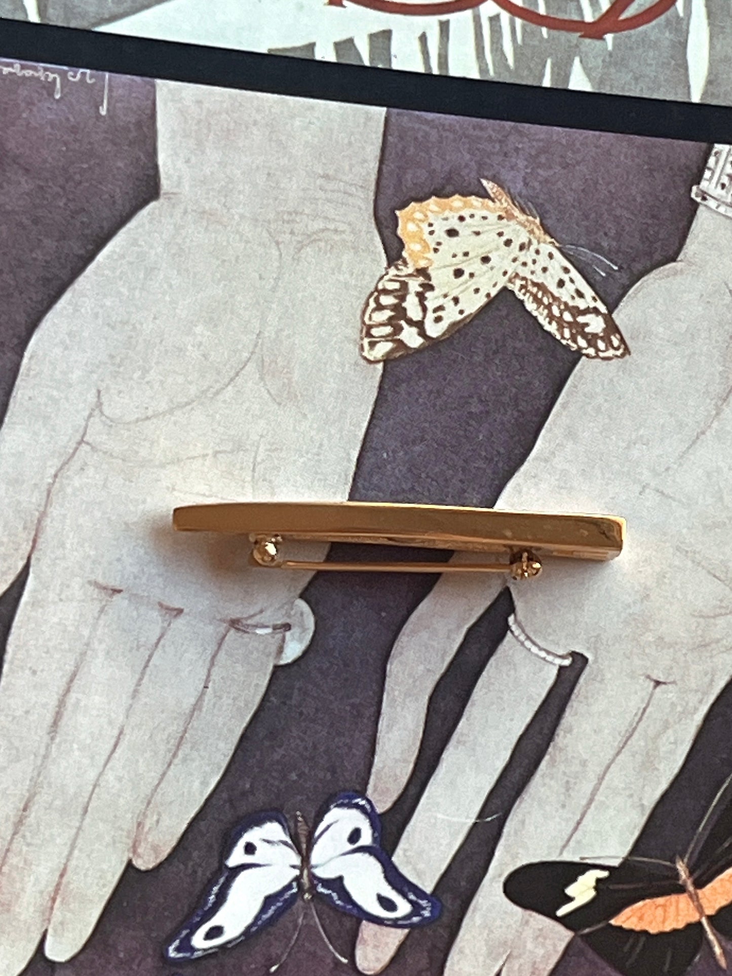 Givenchy 1979 logo brooch