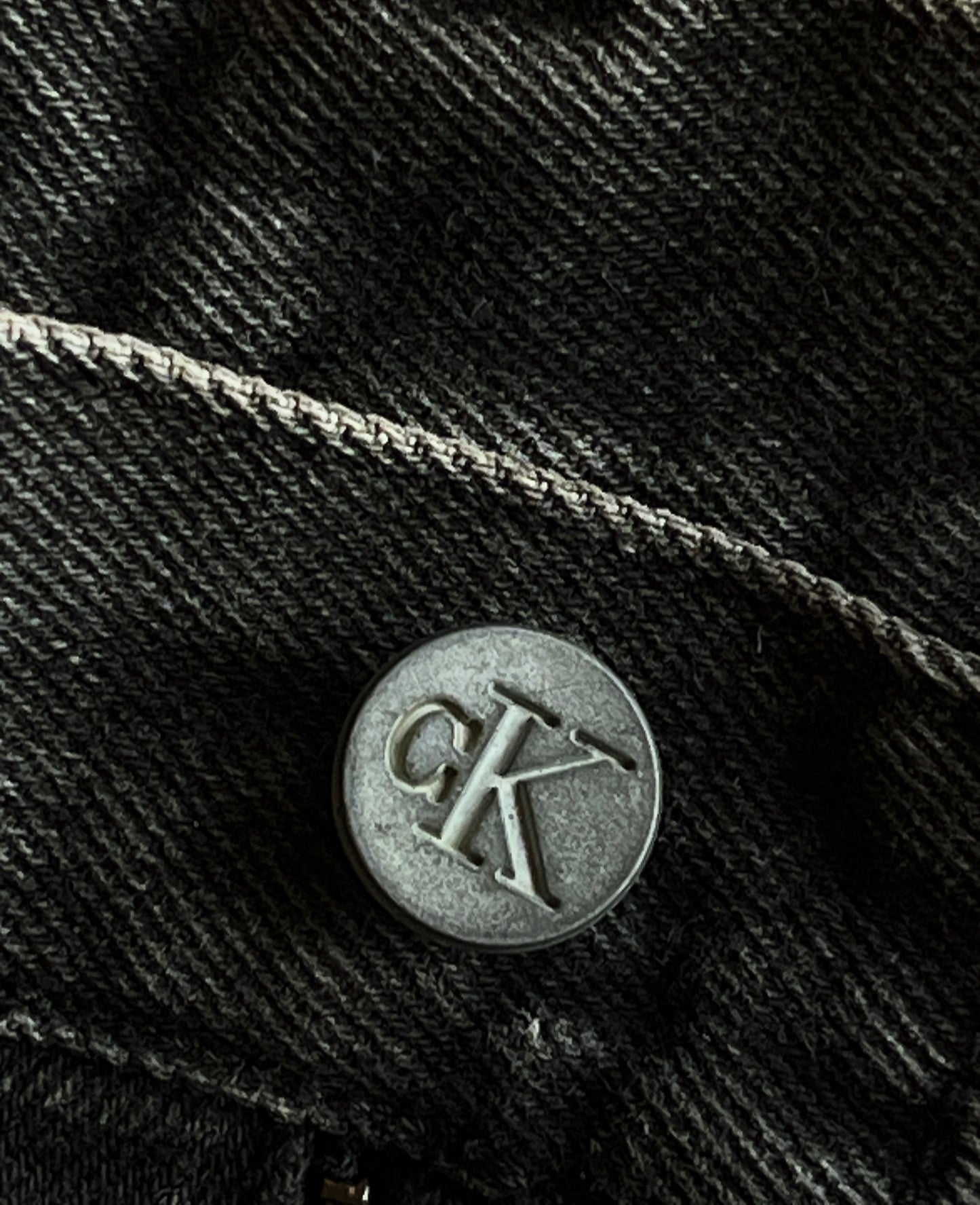 CK black denim shorts