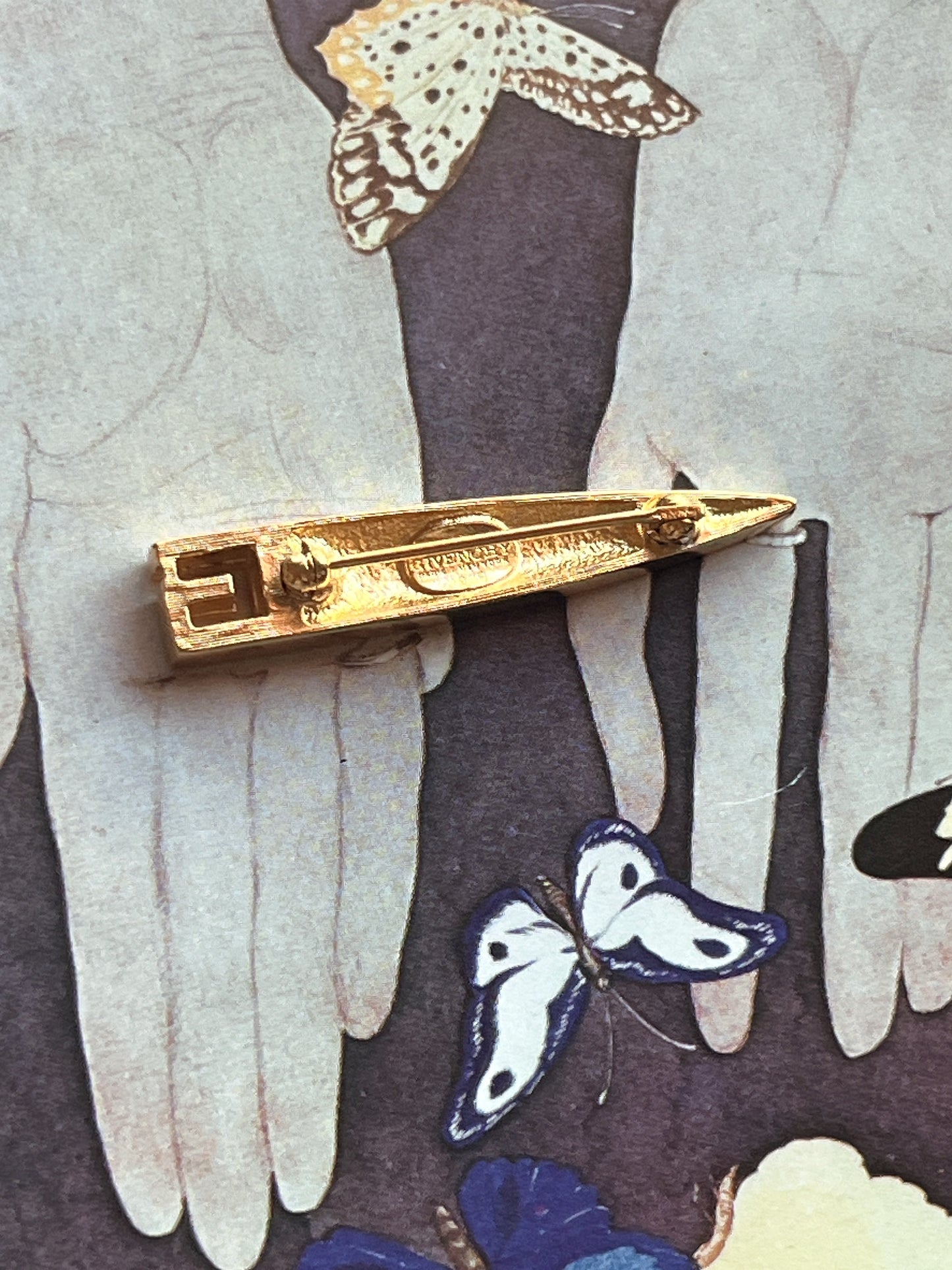 Givenchy 1979 logo brooch